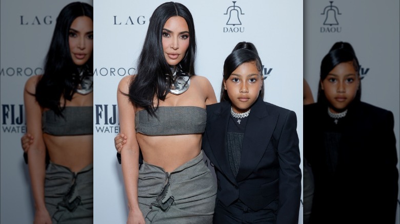 North West posing with Kim Kardashian in suit