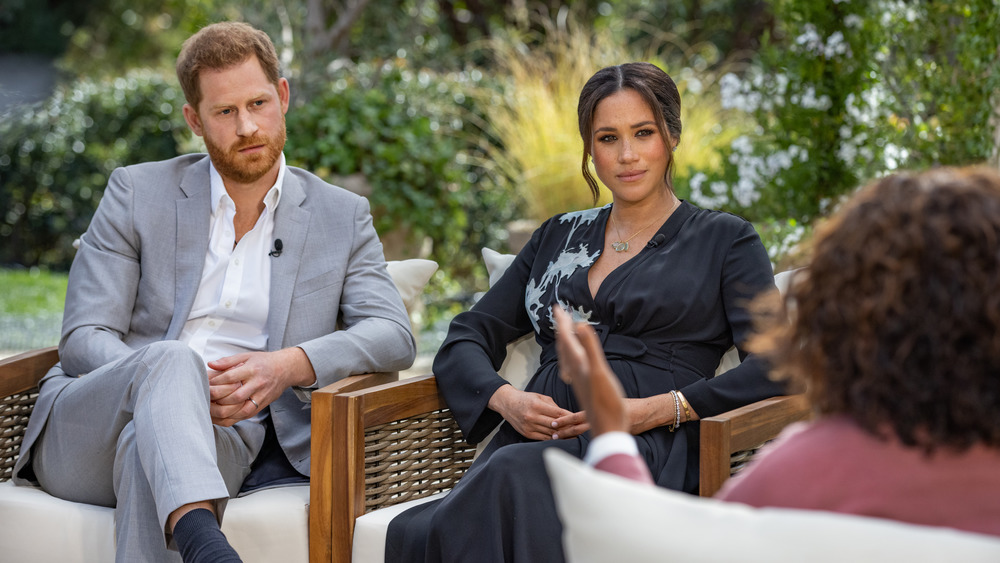 Prince Harry and Meghan Markle being interviewed