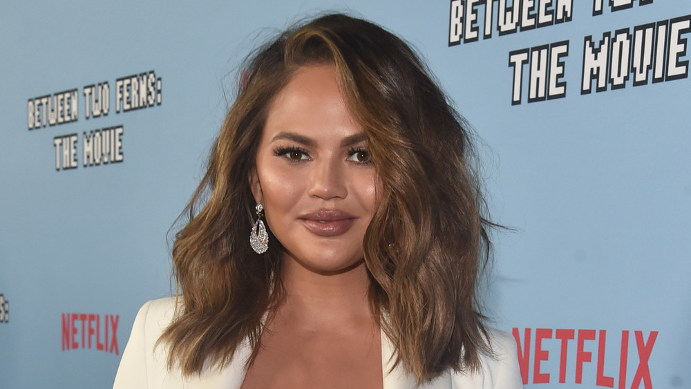 Chrissy Teigen attends a movie premiere 