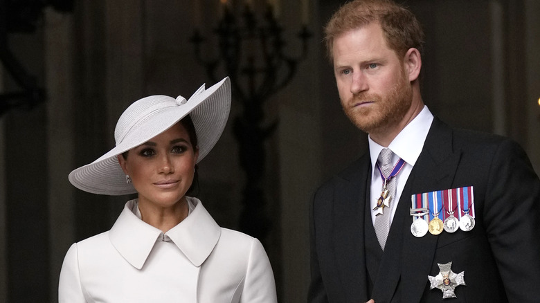 Prince Harry and Meghan Markle posing