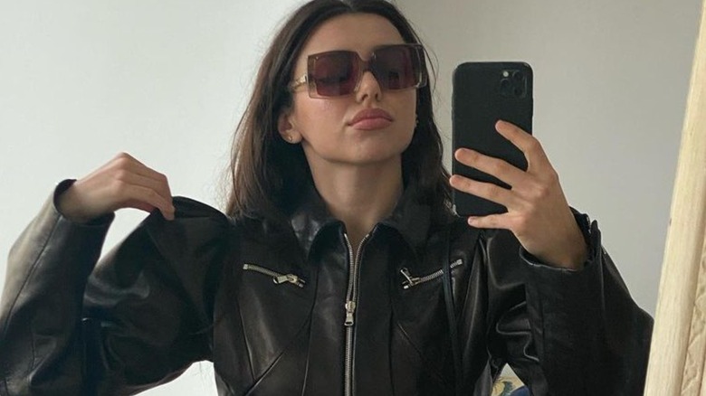 Violet Somers in a black leather jacket