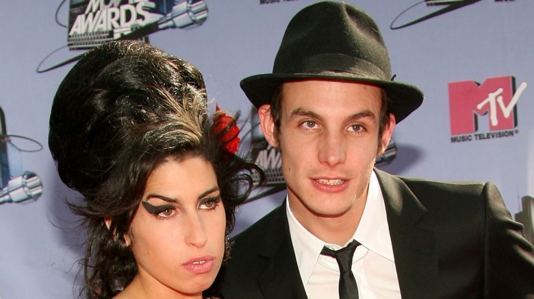 Amy Winehouse and Blake Fielder-Civil, both posing