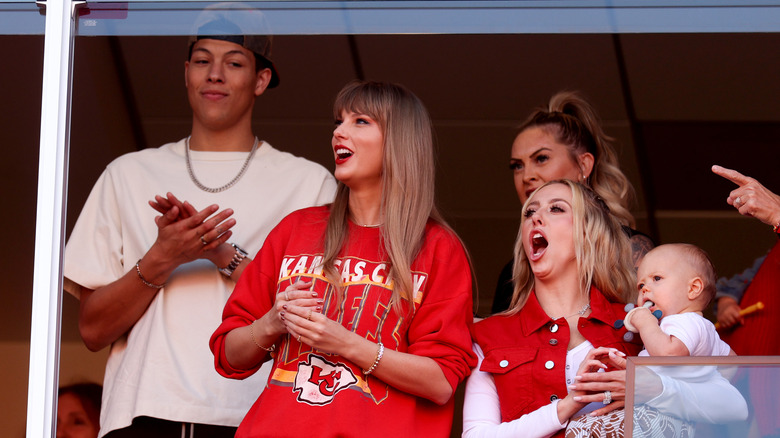 Taylor Swift and Jackson Mahomes watching football