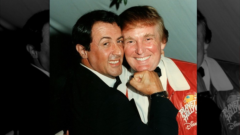 Sylvester Stallone smiling with Donald Trump