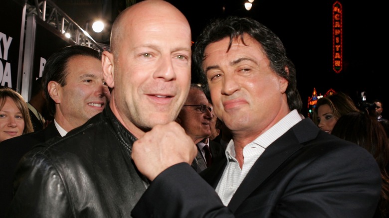 Sylvester Stallone fake punching Bruce Willis