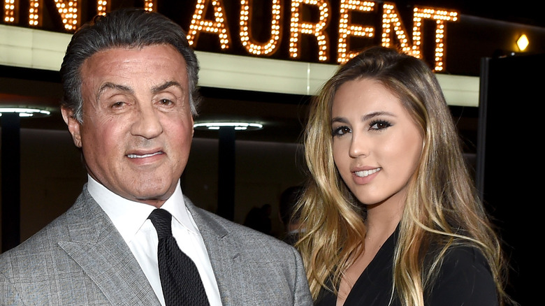 Sophia Stallone and Sylvester Stallone posing together