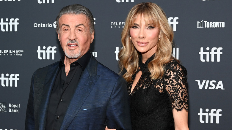 Sylvester Stallone and wife Jennifer Flavin post arm in arm