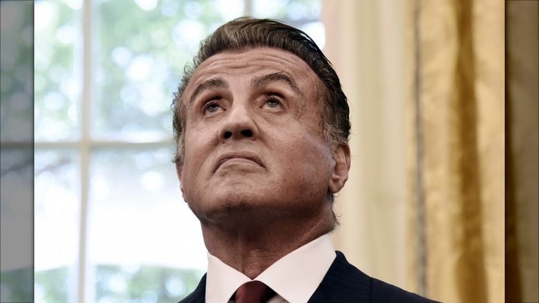 Sylvester Stallone looking up