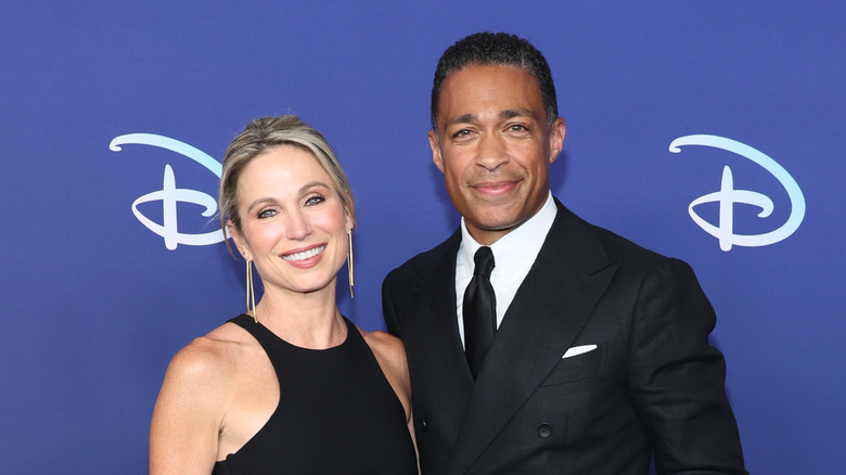 Amy Robach and T.J. Holmes smiling