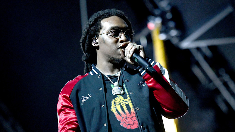 Takeoff performing onstage