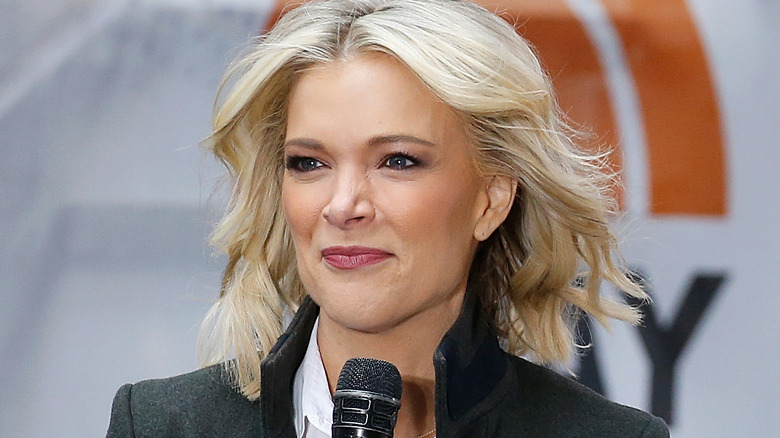 Megyn Kelly in front of microphone