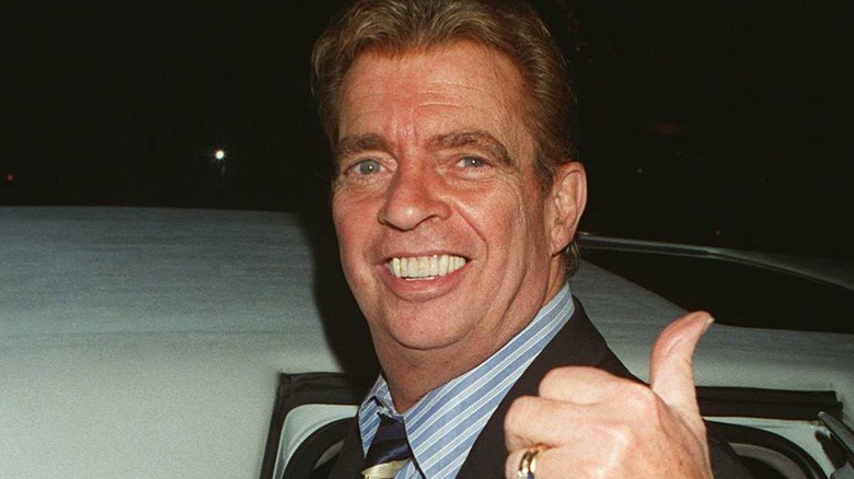 Morton Downey, Jr. giving thumbs up