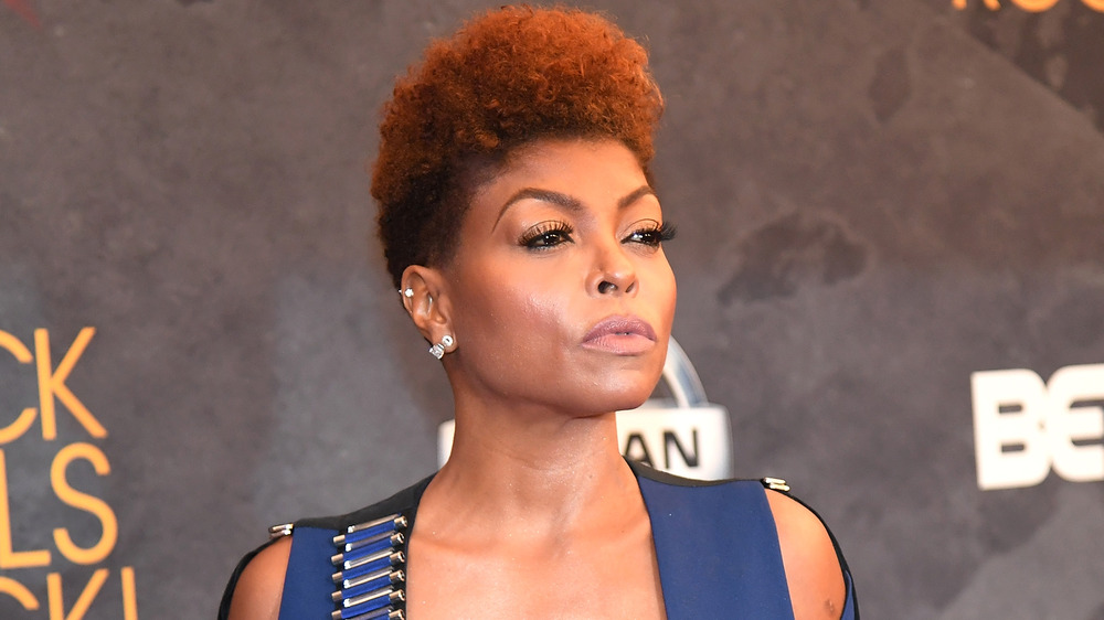 Taraji P. Henson posing with short hair on the red carpet