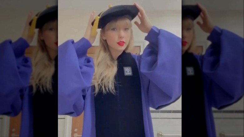 Taylor Swift wearing college graduation cap gown