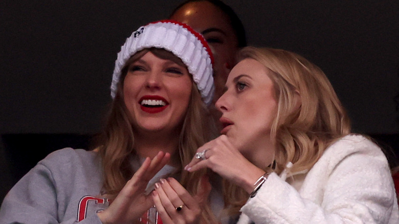 Taylor Swift smiling with Brittany Mahomes