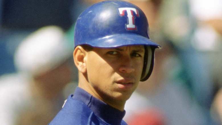 Alex Rodriguez frowning wearing a Texas Rangers cap