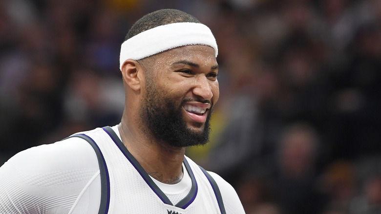 DeMarcus Cousins smiling in a white headband