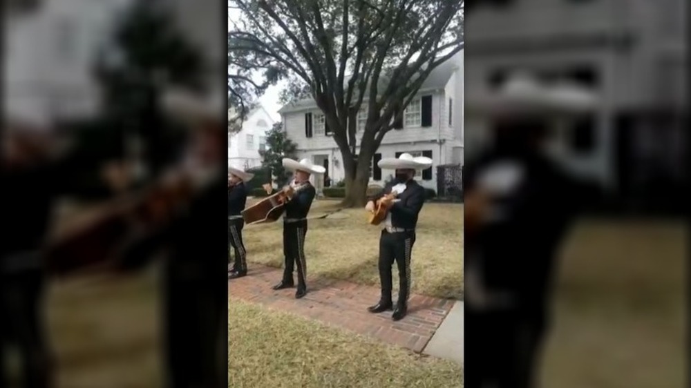 Mariachi band playing in front of Ted Cruz's Texas home