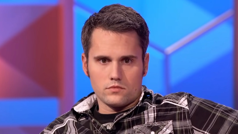 Ryan Edwards looking on, serious expression