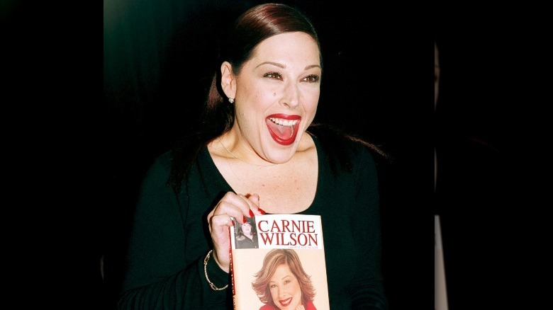 Carnie Wilson holding her book