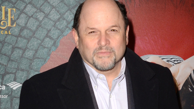 Jason Alexander smiling with goatee