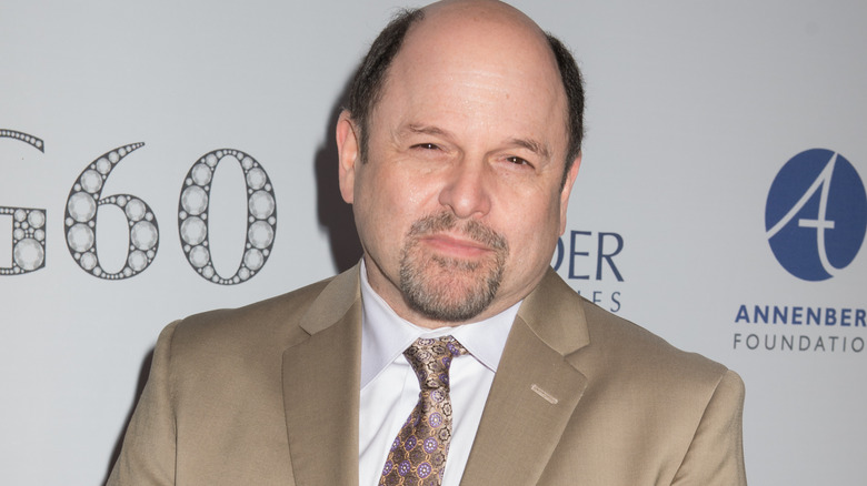 Jason Alexander smiling camel jacket