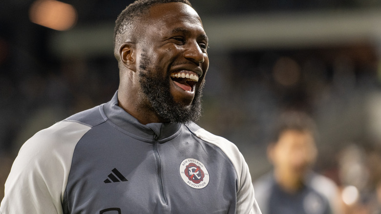 Jozy Altidore smiling on soccer field