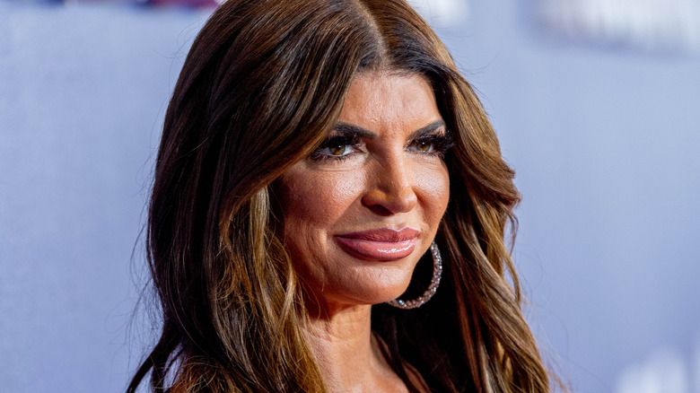 Teresa Giudice smiling diamond hoops