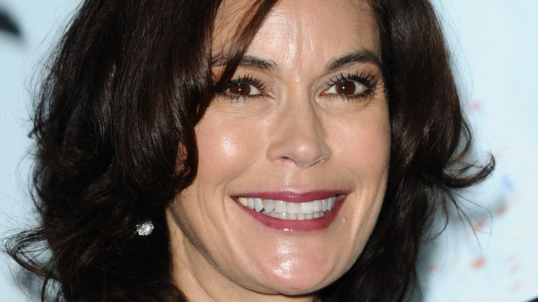 Teri Hatcher smiles on the red carpet