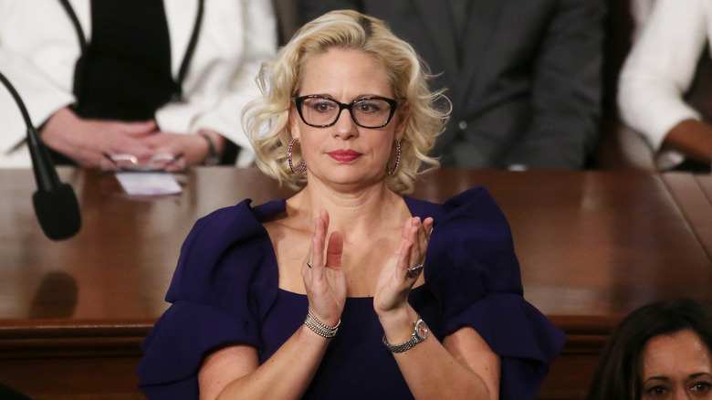 Kyrsten Sinema clapping