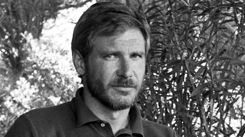 young Harrison Ford in black and white