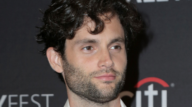 Penn Badgley white collared shirt