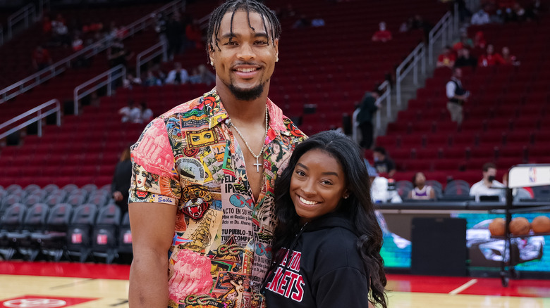 Jonathan Owens and Simone Biles smiling