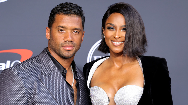 Russell Wilson and Ciara posing at the ESPYs