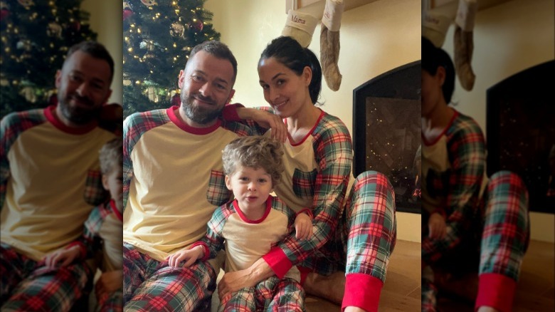 Nikki Bella with her husband and son