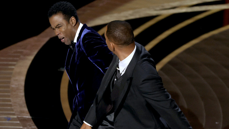 Chris Rock and Will Smith in an altercation at the 2022 Oscars