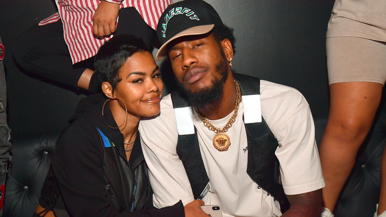 Teyana Taylor posing with Iman Shumpert