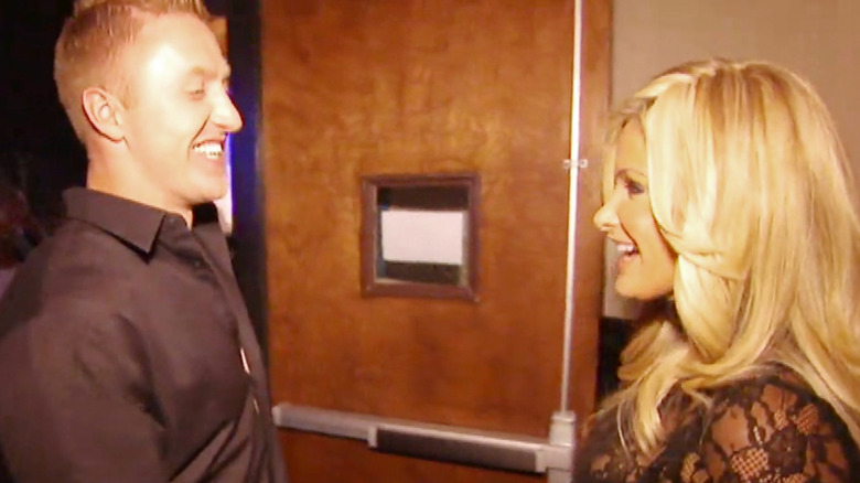 Kim Zolciak- Biermann and Kroy Biermann shaking hands