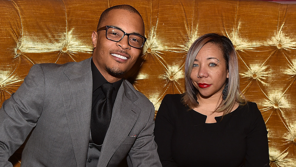 Rapper Clifford "T.I." Harris and Tameka "Tiny" Harris attend Scales 925 Restaurant Ribbon Cutting Ceremony at Scales 925 Restaurant on March 27, 2015 in Atlanta, Georgia. 