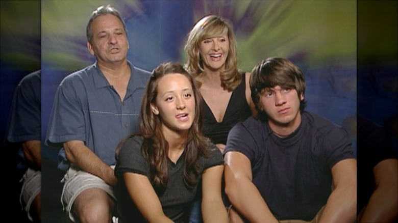 Renee Rogers smiling with family