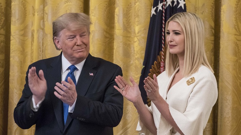 Donald and Ivanka Trump clapping