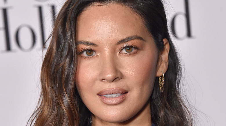 Olivia Munn gazes into the camera