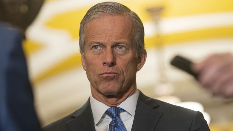 John Thune frowning