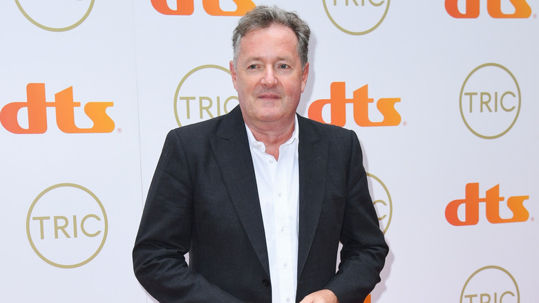 Piers Morgan posing