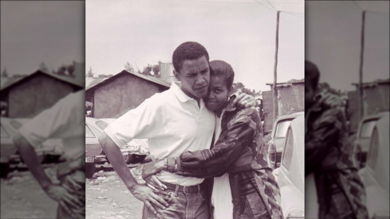 Young Barack and Michelle Obama hug