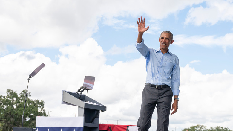 Obama waving at a rally