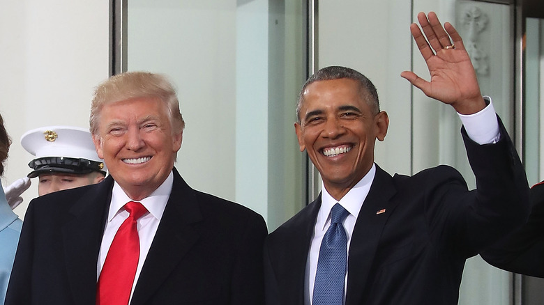 Donald Trump and Barack Obama waving