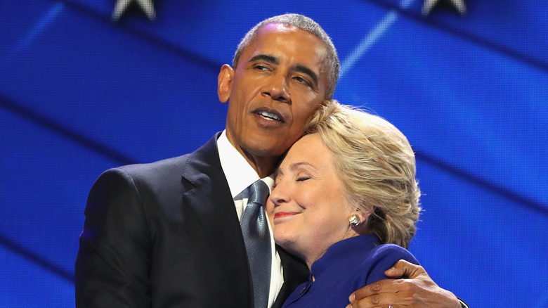 Barack Obama hugging Hillary Clinton