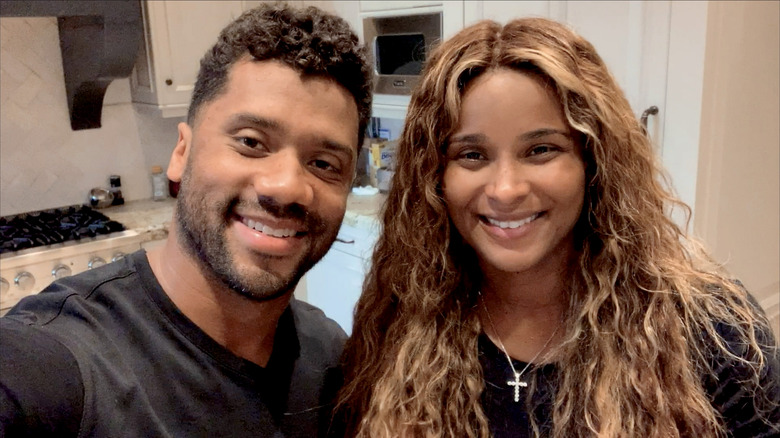 Russell Wilson and Ciara smiling