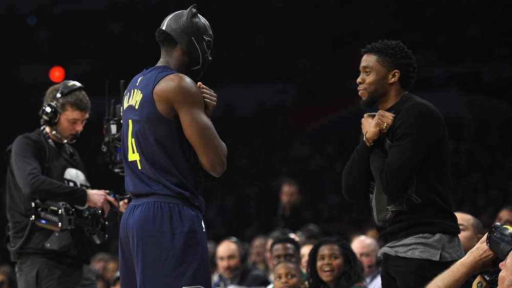 Victor Oladipo, Chadwick Boseman giving the Wakanda salute at the 2018 NBA All-Star Weekend Slam Dunk championship